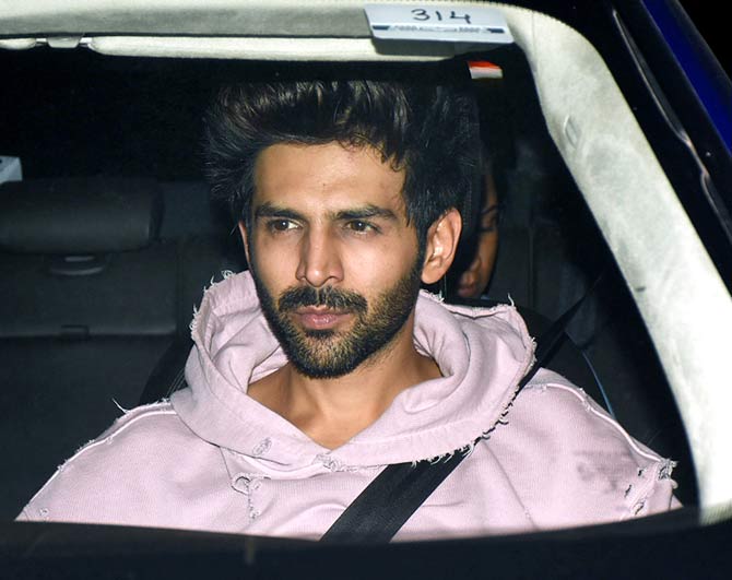 Kartik Aaryan arrived in fully swag and style for the screening of his upcoming film, Pati Patni Aur Woh and we really like that brooding look on his face that's accompanied by stubble. And don't miss that funky shirt that he's donning for the evening. All Pictures/Yogen Shah