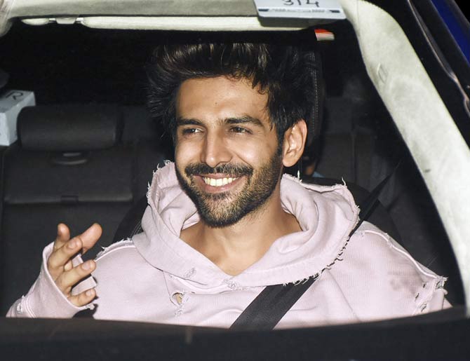Kartik Aaryan has a smile to die for and he can be seen flashing the same in this picture. It seems he's trying to communicate something to the paparazzi or just having some fun with them like most of the actors have these days. The excitement on the actor's face is palpable as Pati Patni Aur Woh is one of the most keenly awaited films of the year.