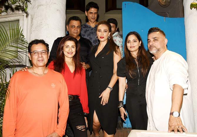 In picture: Raza Beig (extreme right), along with Atul and Alvira Agnihotri, Iulia Vantur, Yasmin Karachiwala and other guest pose for the photographers post the bash.
