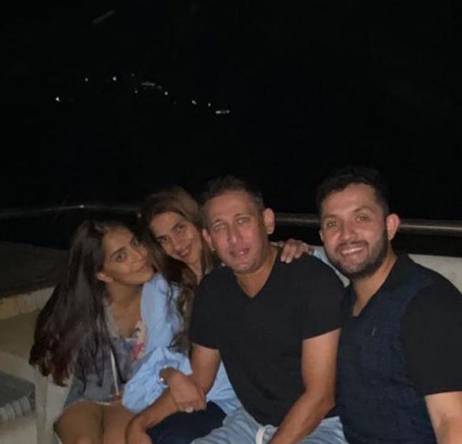 In picture: Ajit Agarkar and his wife with their friends during an outing
