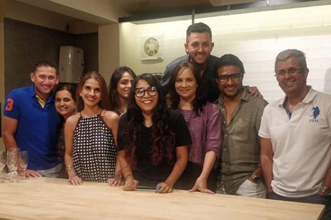 Ajit Agarkar shared this photo with his wife and friends and captioned it: Great evening with lovely people and exceptional food by @popupsbydevika @sanjaysphotos @raunak.kapoor @fatemaagarkar @ataship @gauravkalra75