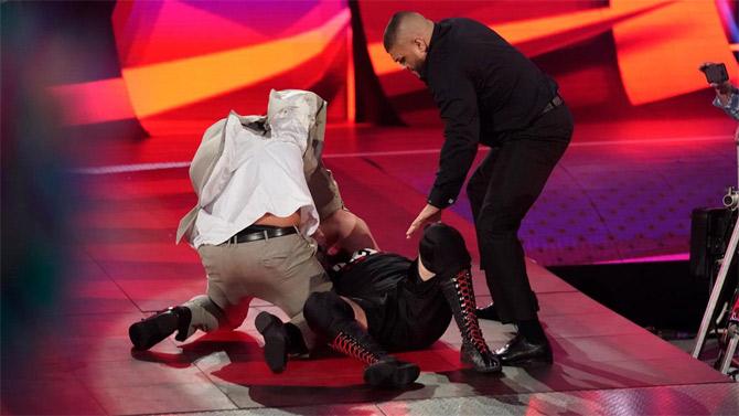 However, during Lashley's match with Owens, AOP appeared and began attacking Owens which led to a disqualification