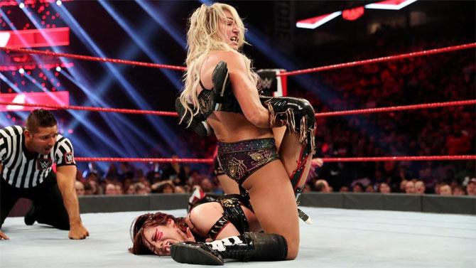 Charlotte Flair had an uphill task for her as she faced the Kabuki Warriors - Asuka and Kairi Sane in a 2-on-1 Handicap match