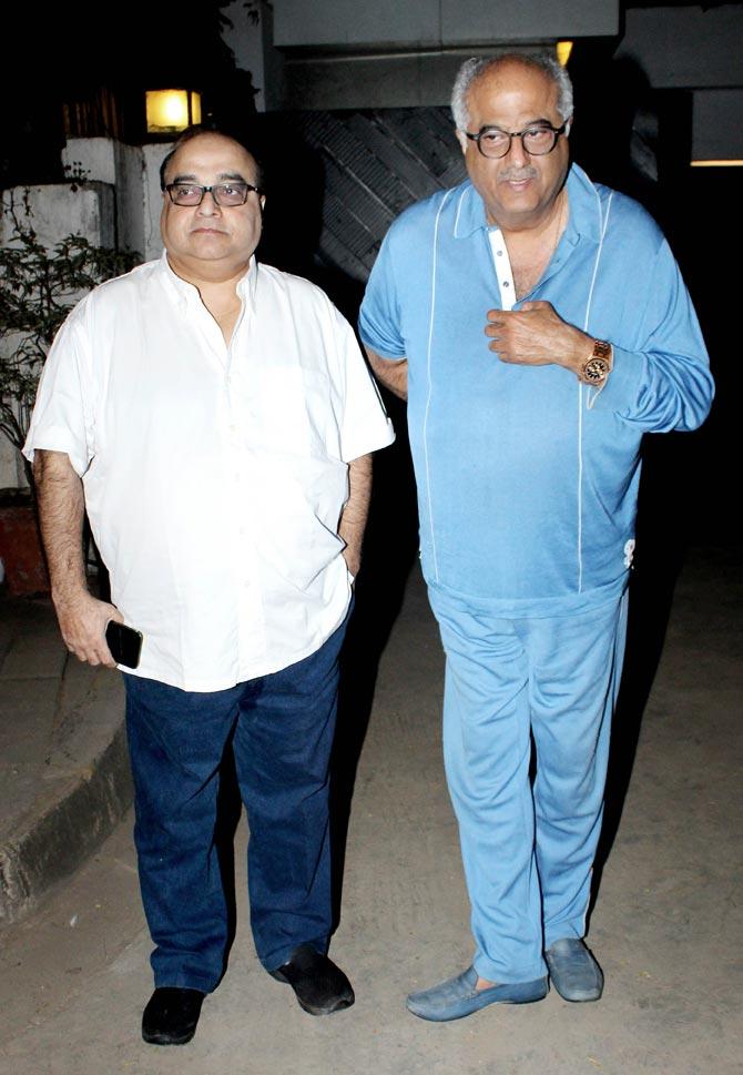 Producer Boney Kapoor came in with friend director Rajkumar Santoshi for the party at Nirmal Kapoor's residence in Bandra.