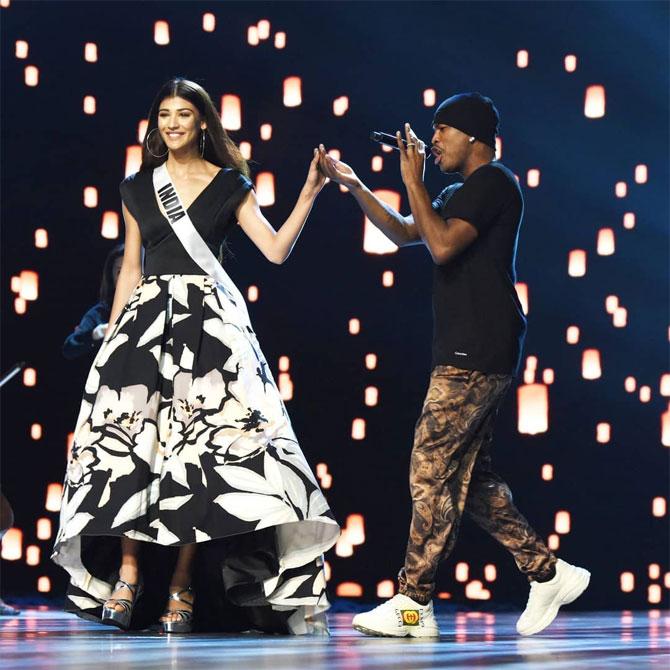 At one of the preliminary rounds of Miss Universe last year, she looked elegant, walking the ramp in a black and white asymmetrical gown in a minimal look teamed with hoop earrings and hair let loose.
