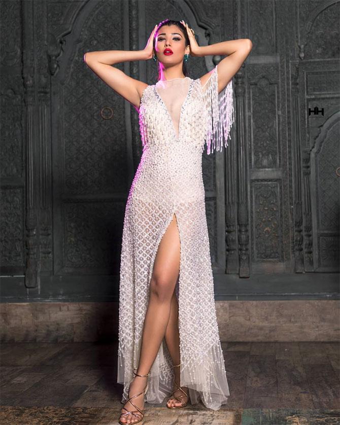 Chudasama set temperatures rising in this white sequinned gown at a photo shoot