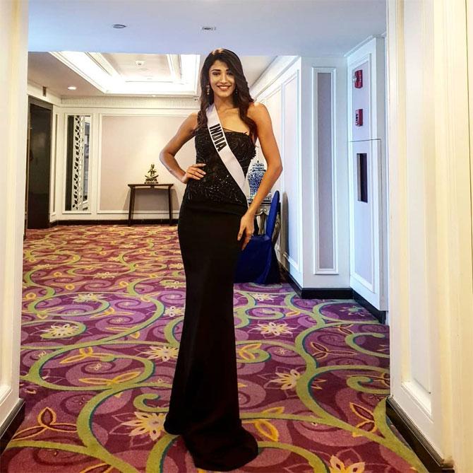 Black is her colour as she shimmers in this embellished gown in Thailand during the Miss Universe competition last year. 