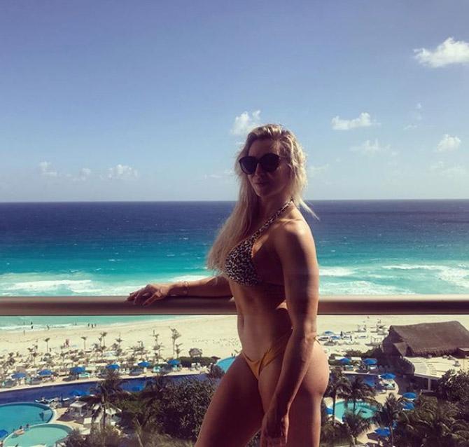 Record 10-time WWE women's champion Charlotte Flair posted this photo wishing all her WWE fans a Happy New Year