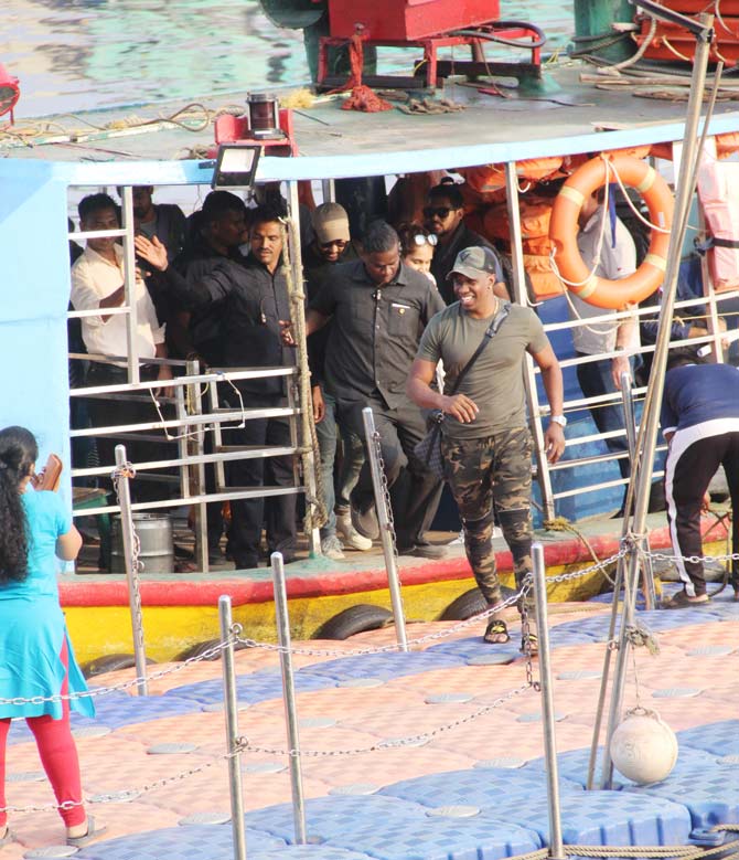 Dwayne Bravo was all smiles as he was spotted getting off the ferry at Versova