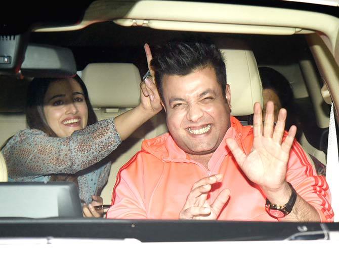 Varun Sharma and Kriti Sanon's sister Nupur had fun posing for the photographers as they arrive for Panipat screening.