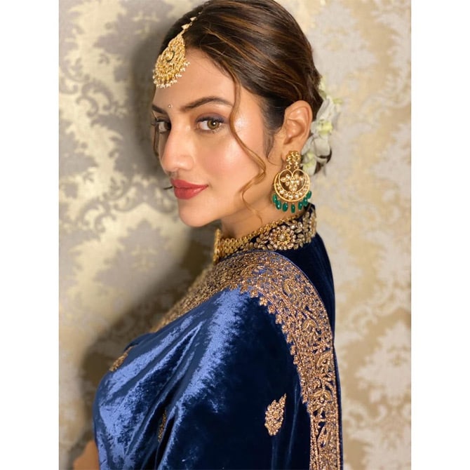 Recently, Nusrat Jahan had shared a few stunning photos of herself in ethnic wear where she was seen warming up for the wedding season. Donning a salwar suit set in hues of blue and red, Nusrat looked all set for the 'shaadi season'