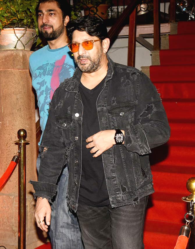 Arshad Warsi arrived in full style for Isha Koppikar and Timmy Narang's bash. He may have been dressed rather casually in that black jacket, black shirt, and pants, but his presence alone is enough to bring the house down, given his sense of humour and wit.