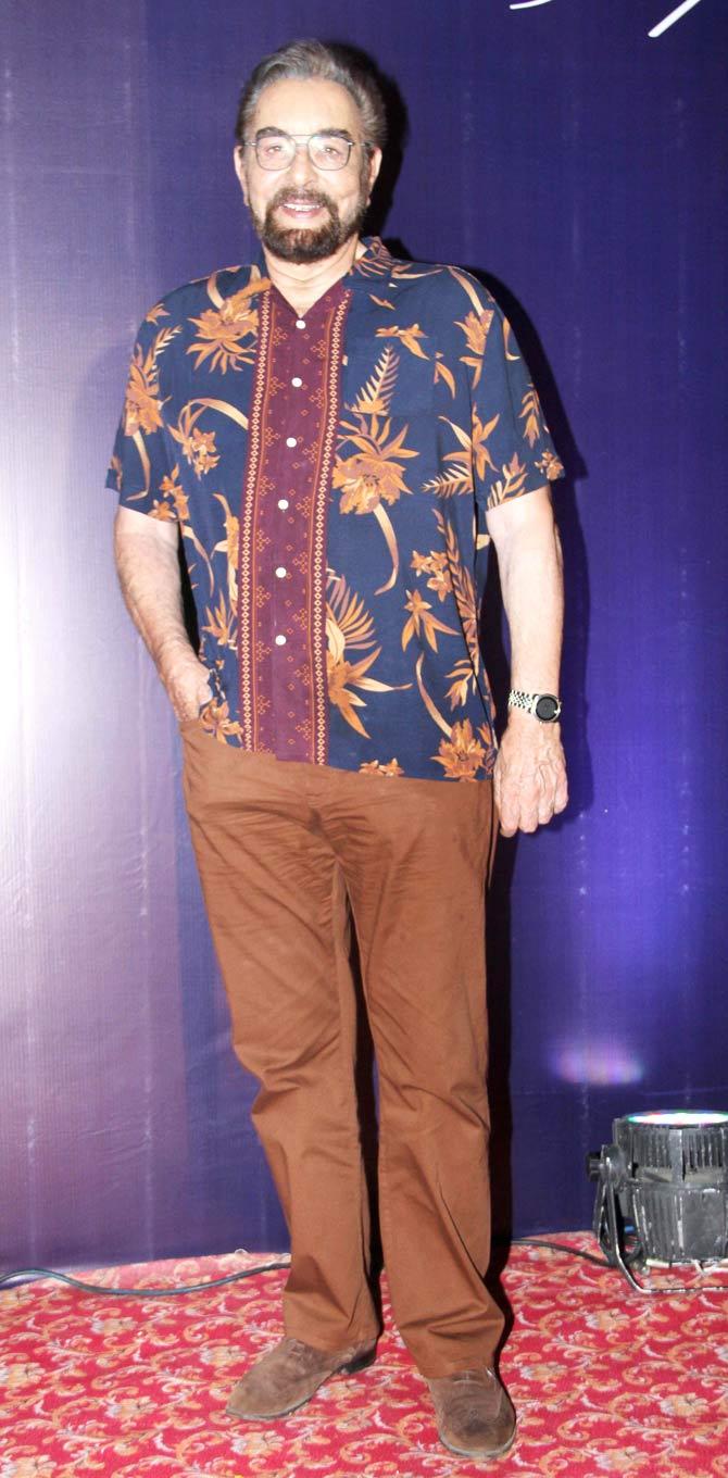 Kabir Bedi graced the reception donning a simple-yet-stylish dark blue printed shirt and brown pants.