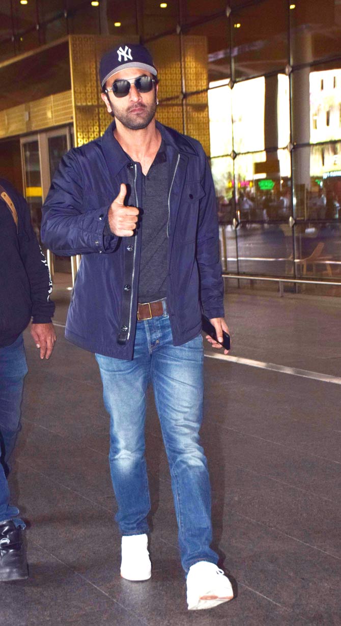 Ranbir Kapoor and host of other Bollywood celebrities were spotted at the Mumbai airport. Ranbir sported a blue jacket, grey tee and denim, which he paired with a Yankees cap and white sneakers. All pictures/Yogen Shah