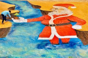 Artist Sudarsan Pattnaik creates giant 3D sand Santa Claus in Odisha
