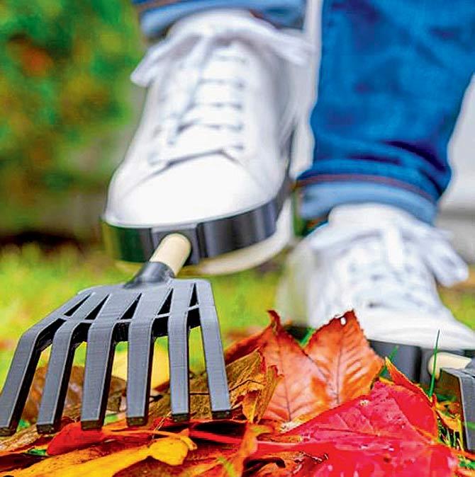 Strap-on rake for your shoes to clean up all the fallen leaves