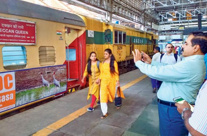Photos on the train have been shot by MTDC MD Abhimanyu Kale, seen in picture on the right taking photos of the train