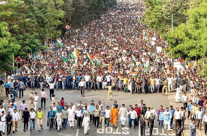 Mamata Banerjee leads a rally of thousands, vowing to not allow the proposed countrywide NRC and CAA, in Kolkata, on Monday