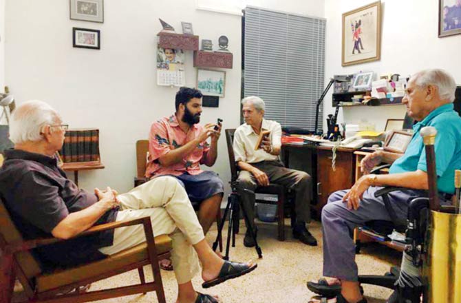 Akshya Mahajan (second from left), creative collaborator with Goa Familia, during a session with the family