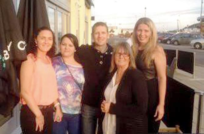 Stuart Quillian with his four sisters and mother during her 60th birthday celebration in Douglas. Pic courtesy/Barabara Byron