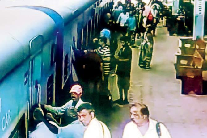 A CCTV camera footage shows Tarun Gupta at Sawantwadi station