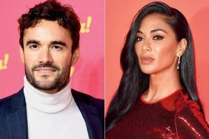 Scherzinger spends time with Thom Evans in London