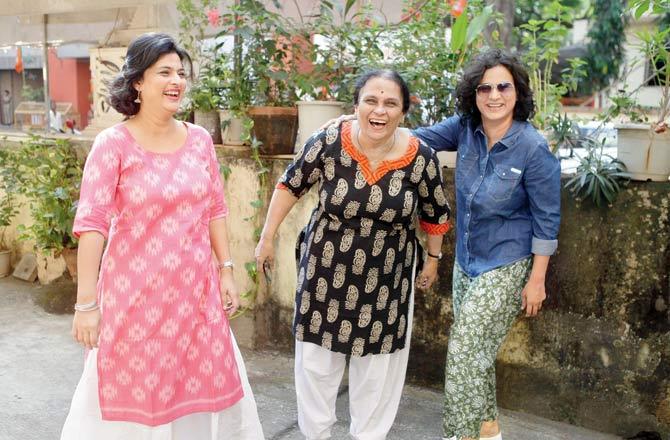 Sumitra Samant, flanked by daughters Janhavi and Tanvi, outside Loukik building in the neighbourhood Janhavi describes in a book published earlier this year