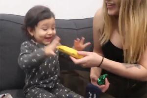 Toddler's reaction on parentsu00e2u0080u0099 Christmas gift is melted hearts online