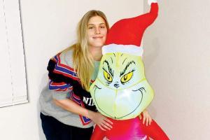 Tennis babe Eugenie Bouchard's Christmas date with The Grinch!