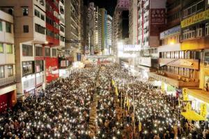 Hong Kongers mark protest anniversary with rally
