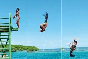 Gymnast Simone Biles' daredevil dive during beach holiday!