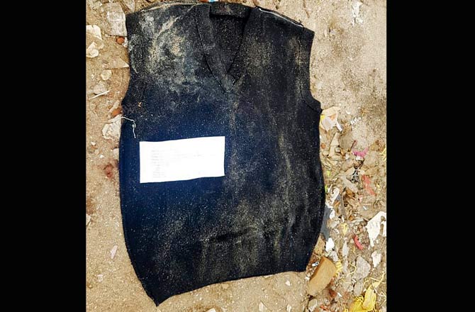 The sweater found in the suitcase that was dumped in Mithi River with Bennett