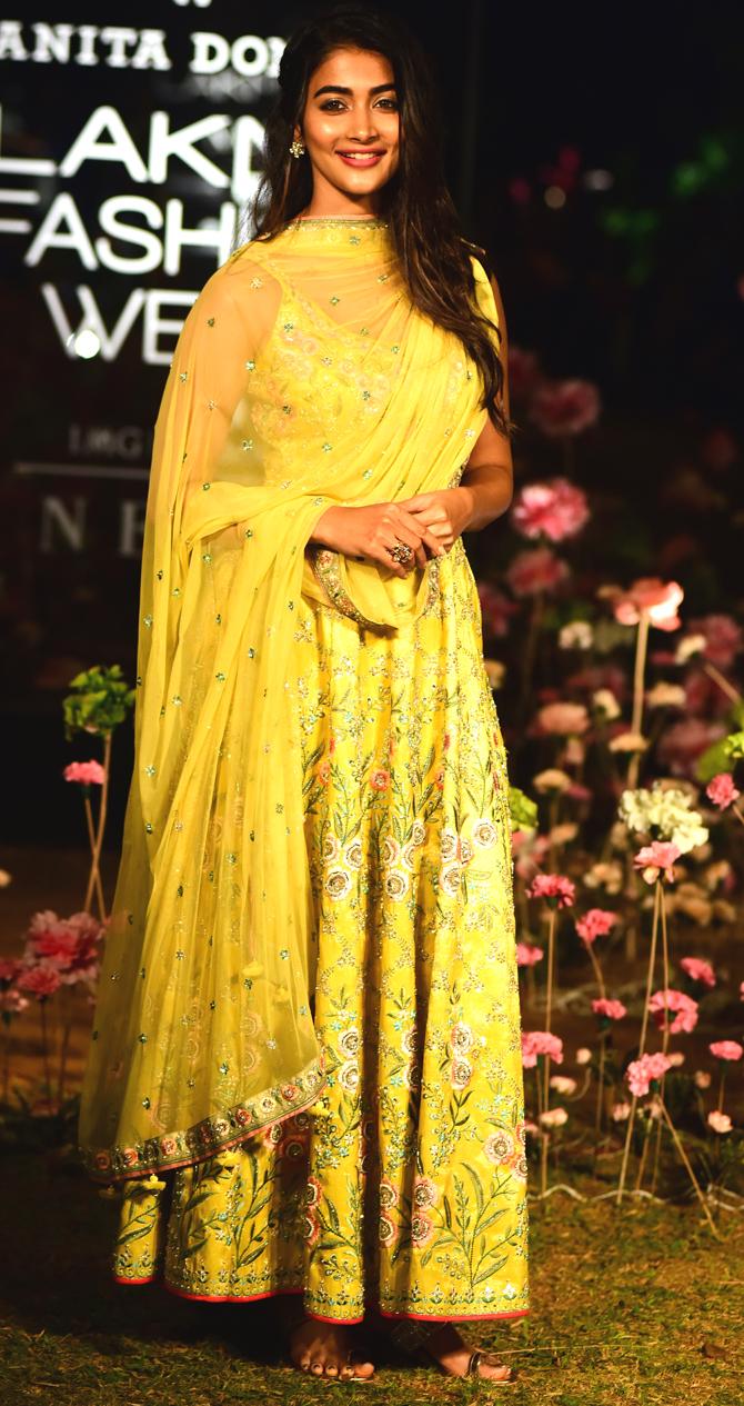 Pooja Hegde was all smiles as she poses for the photographers at the launch of Anita Dongre's new collection on Day 2 of Lakme Fashion Week 2019.