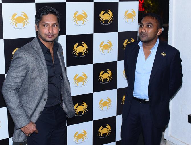 Kumara Sangakkara was wearing a grey suit with a dark blue shirt and matching trousers, while Mahela Jayawardene was wearing a dark blue suit with a light blue shirt and dark blue trousers.