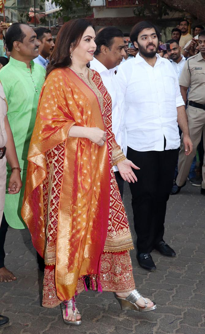 Reliance Industries Chairman and Managing Director Mukesh Ambani and wife Nita Ambani sought the blessings of Lord Ganesha at Siddhivinayak temple in Prabhadevi, Mumbai as the two offered the first wedding card of their son Akash Ambani