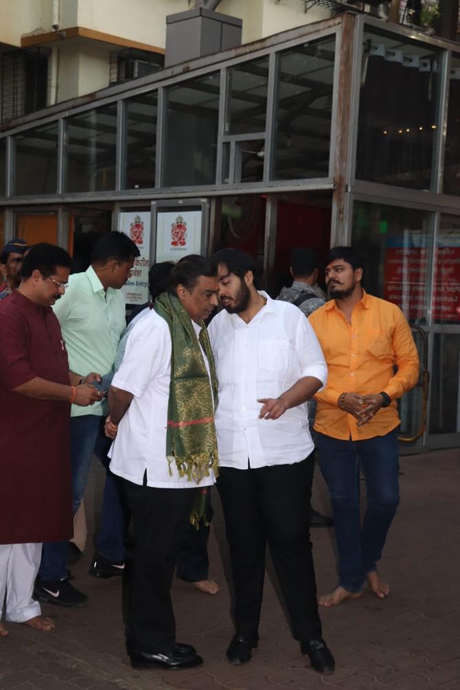 In picture: Father-son duo Mukesh and Anant Ambani are seen having a candid conversation outside the Siddhivinayak temple soon after they sought the blessings of the deity for Akash Ambani and Shloka Mehta's wedding.