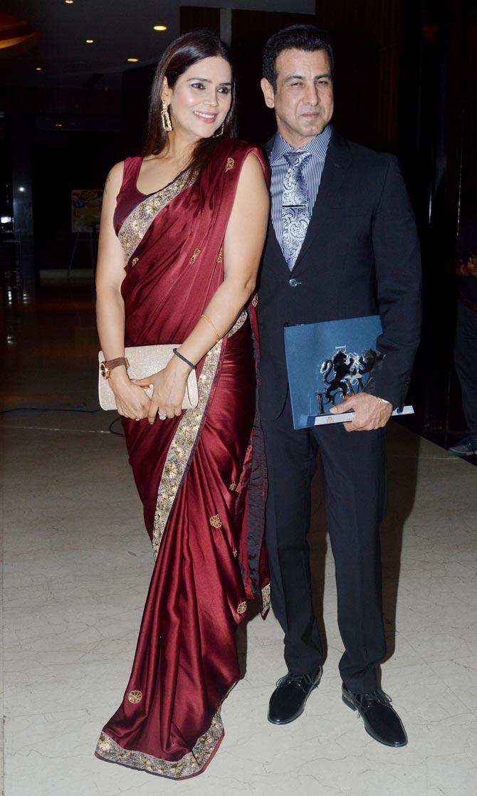 Ronit Roy and wife Neelam were all smiles when clicked by the paparazzi at the award ceremony. While Neelam opted for a saree, Ronit looked dapper in a blue suit at the event.