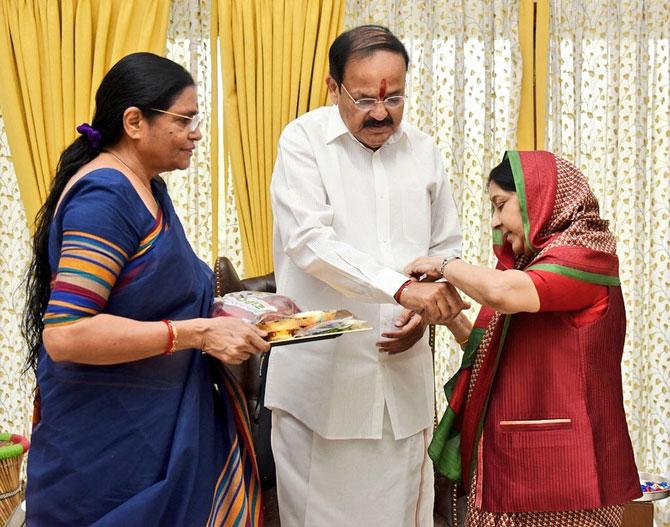 Sushma Swaraj served as Cabinet Minister in Haryana for Labour & Employment, Housing, Education. She also held positions like Minister for Information and Broadcasting, Telecommunication, Health & Family Welfare, Parliamentary Affairs in the Union Cabinet and Minister for External Affairs in the Union Cabinet.
In photo: Sushma Swaraj with her 'rakhi brother' M Venkaiah Naidu.