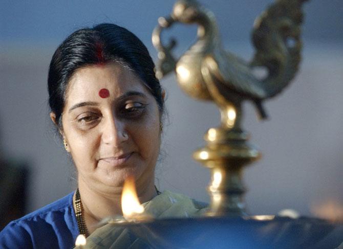 Sushma Swaraj inaugurates the health exhibition 'Arogya 2003', by lighting a traditional lamp in New Delhi, on September 25, 2003. The exhibition highlighted various Indian systems of complimentary medicine such as Ayurveda, Siddha, Unani, Homeopathy and Yoga which form an integral part of the country's centuries old therapeutic heritage
