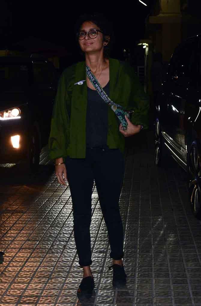 Kiran Rao smiled at the shutterbugs as she arrived for the screening. She wore a black top and jeans with an olive green jacket.