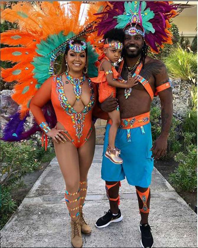 Since his ODI debut in 1999, Gayle has been one of the most feared batsmen in the shorter formats of the game. He has scored 23 ODI hundred for West Indies, including the first-ever World Cup double century against Zimbabwe during the 2015 World Cup. 
In picture: Chris Gayle with his partner Allysa and daughter Krisallyna at the Carnival