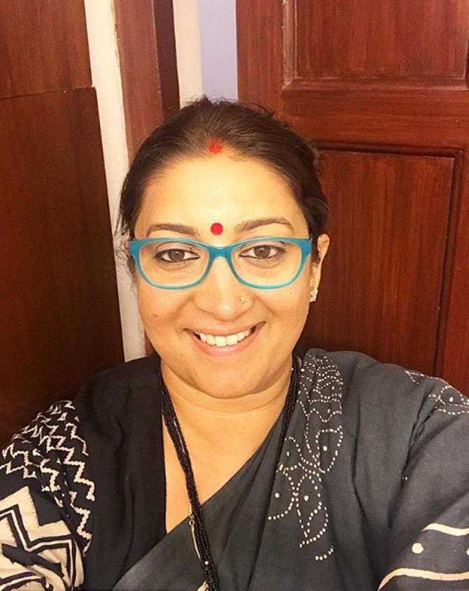Smriti Irani who is well known for her wit and humour also shares candid selfies and photos of herself with family on Instagram. Though not tripping on 'Kala Chasmah', Smriti captioned this picture of hers 'Not kaala chashma' (not black shades) as she is seen doing velagiri! (timepass)