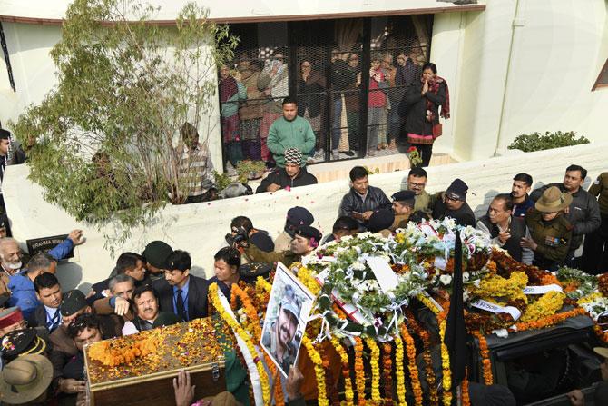 People had climbed to rooftops and also stood on either side of the road leading to the officer’s residence. The mortal remains were brought home in a coffin wrapped in the national flag late on the night of February 18, 2019