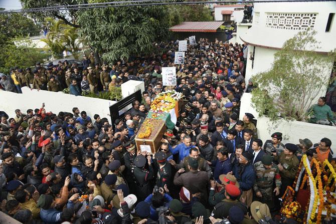 The mortal remains of Major Vibhuti Shankar Dhoundiyal were consigned to flames with full state honours in Haridwar on Tuesday