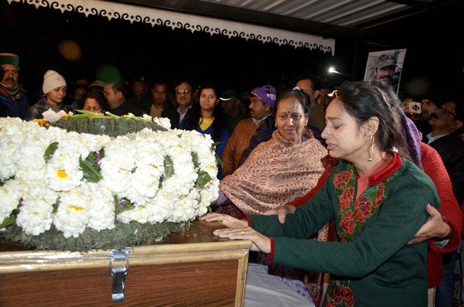 Major Vibhuti Shankar Dhoundiyal's mother Saroj, a cardiac patient, his wife Nikita Kaul, whom he had married less than a year ago, and a host of relatives and friends were crying inconsolably as his coffin was kept for people to pay their last respects before being taken to Haridwar for the last rites