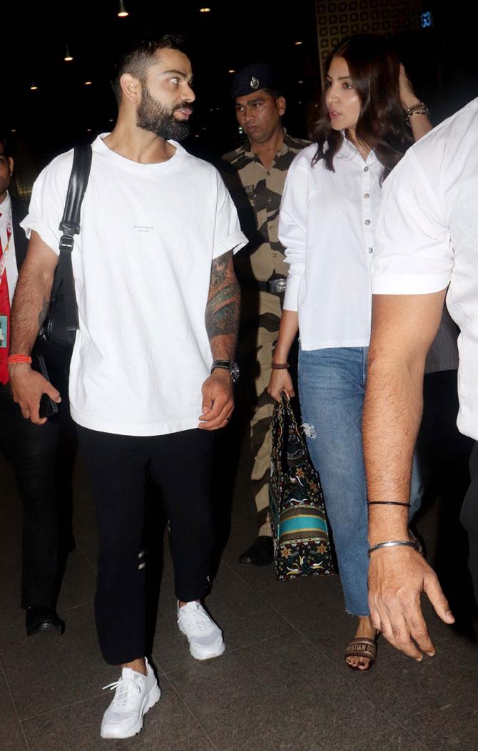 Virat kohli wearing white sneakers on sale