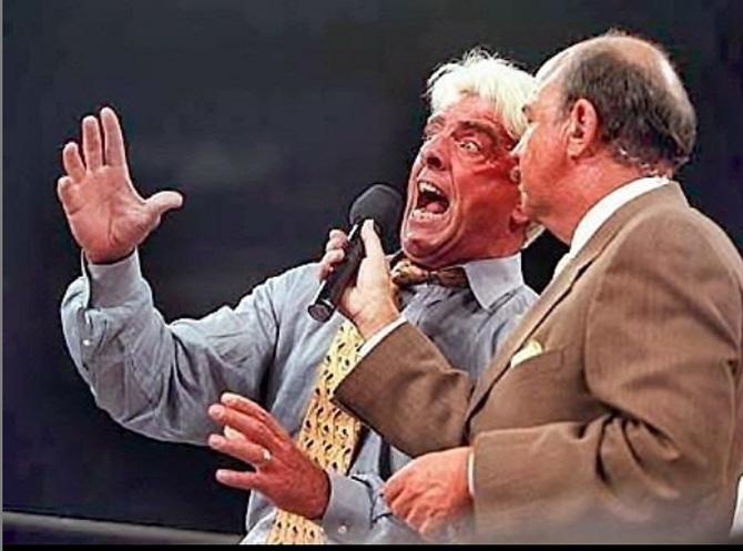 Ric Flair was always an animated character in the ring. He posted this picture of himself from his days in the administration of WWE, giving some sort of an interview duing one of the episodes in the 1990s