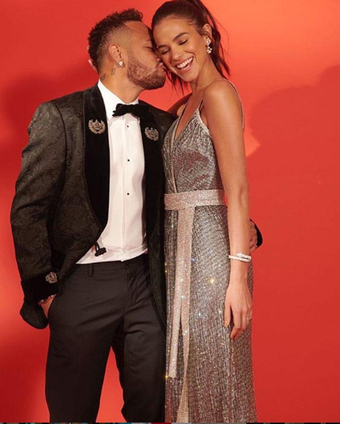 At Paris St Germain, Neymar has so far appeared in 85 games scoring an impressive 70 goals with 41 assists.
In picture: Neymar with Bruna at an event
