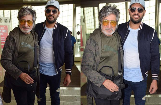 Shakti Kapoor was wearing a green t-shirt with a military jacket and orange sunglasses. He was also carrying a black sling bag.