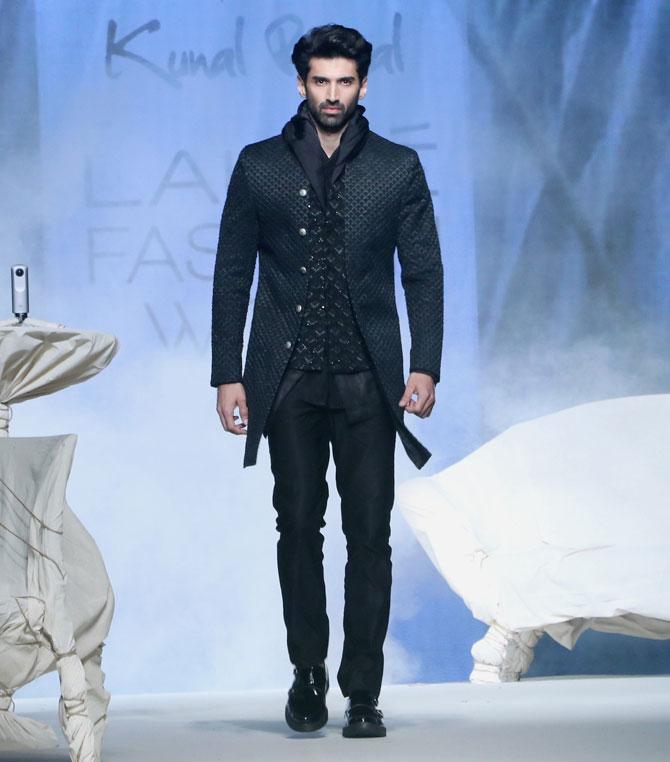 Aditya Roy Kapur walked the ramp for the fashion designer Kunal Rawal at the Lakme Fashion Week Summer/Resort 2019. 'Kalank' actor Aditya Roy Kapur turned showstopper and sashayed on the runway with swag for the Boat collection. The audience was in for surprise when actor Arjun Kapoor also walked for the same designer.